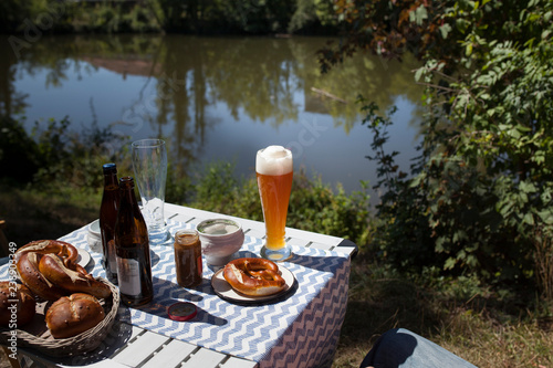 Breakfast with Bavarian veal sausage, wheat beer and pretzels photo