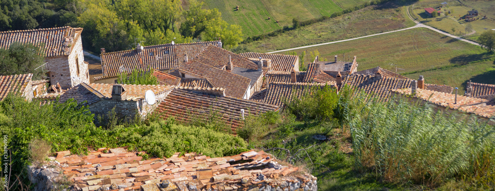 View of the characteristic Italian village. Rural scene with roofs
