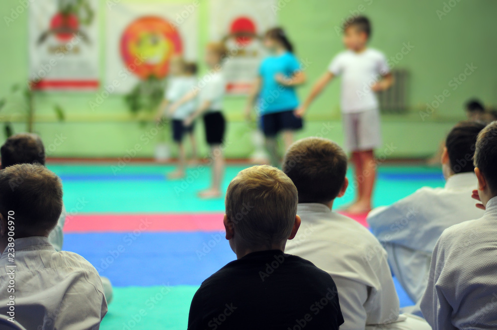 The first exam in karate. Exam for the right to wear a kimono. For web pages or advertising printing. Persons blurred beyond recognition. The first exam in karate. Exam for the right to wear a kimono. For web pages or advertising printing. Persons blurred beyond recognition.