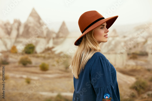 Fall Fashion. Beautiful Woman In Hat, Dress In Nature Portrait