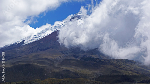 The Cotopaxi volcano behind clouds