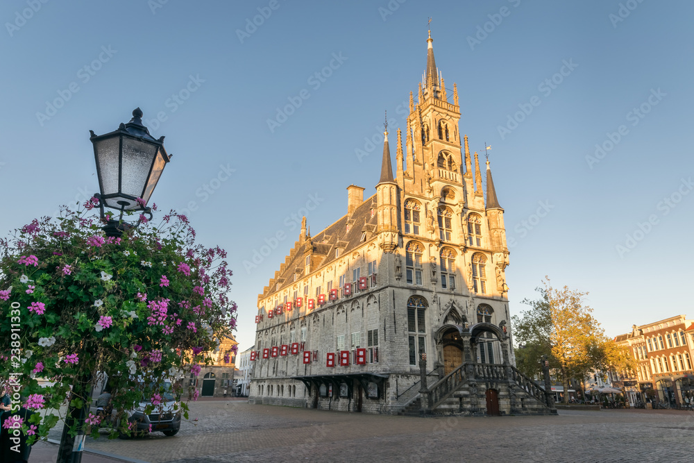 Gothic city hall of Gouda, The Netherlands at sunset