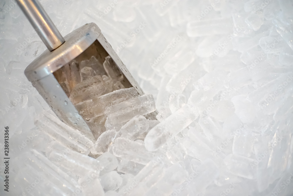 Top view of Stainless steel bar ice scoop in Ice bucket. Top view of Stainless steel bar ice scoop in Ice bucket.