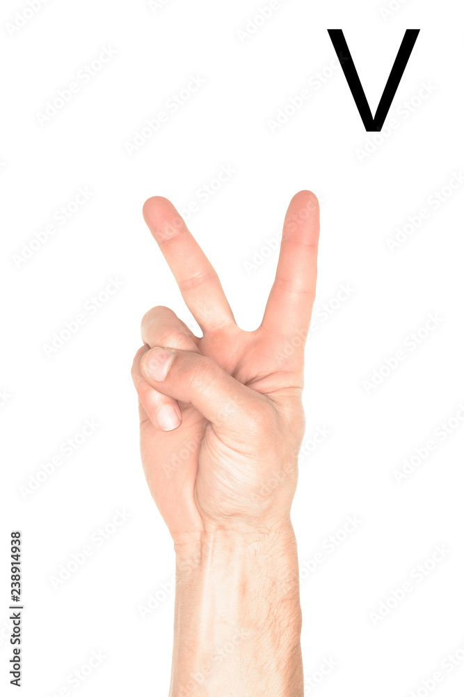 partial view of male hand showing latin letter - V, deaf and dumb language, isolated on white partial view of male hand showing latin letter - V, deaf and dumb language, isolated on white