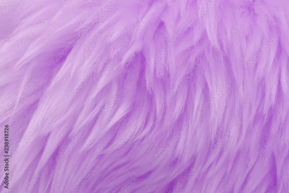 Fototapeta premium Pink animal wool texture background. Rosy tint natural wool. Close-up texture of plush fluffy fur