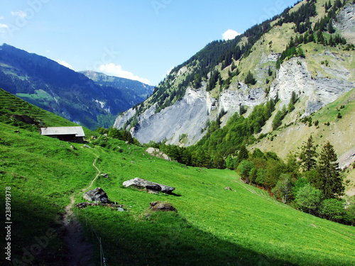 Mountains and rocks in the valley Weisstannenthal - Canton of St. Gallen, Switzerland photo