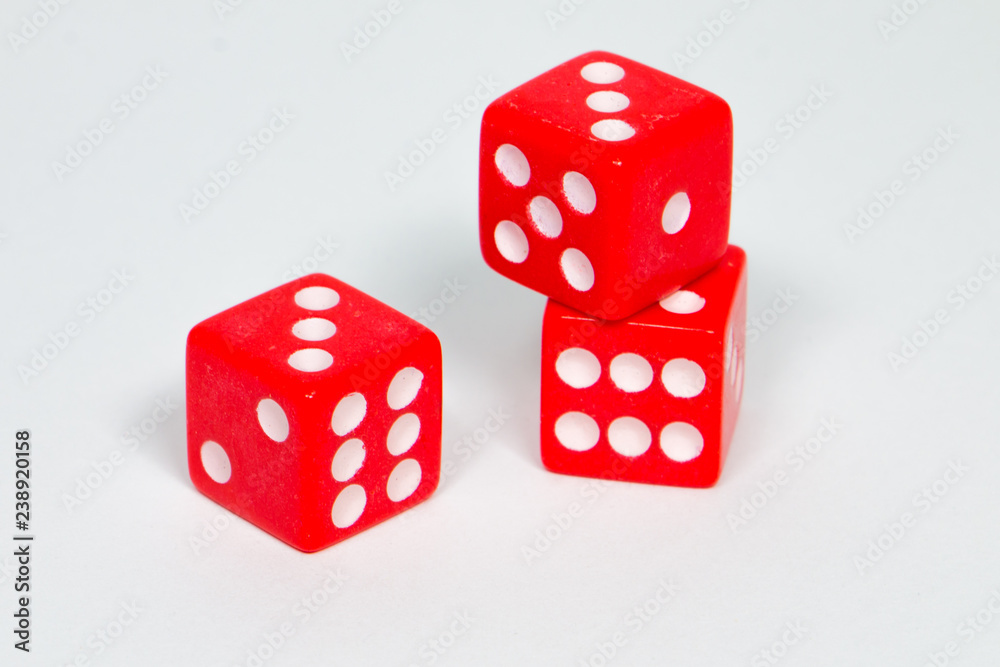 square dice in red on a white background square dice in red on a white background