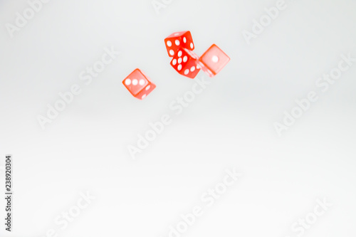 square dice in red on a white background