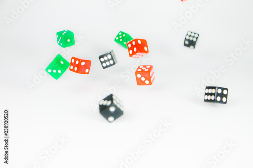 colorful square dice on white background. black, red, green © ppicasso