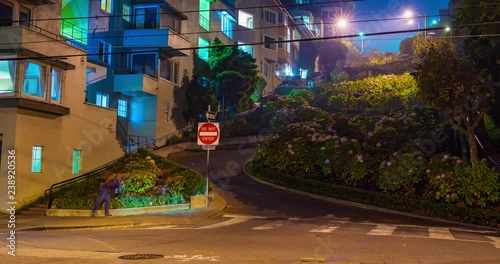 Bottom Lombard Street Time-lapse Wide Night. a time-lapse zooming out the bottom of famous Lombard Street in San Francisco during night with traffic streaks