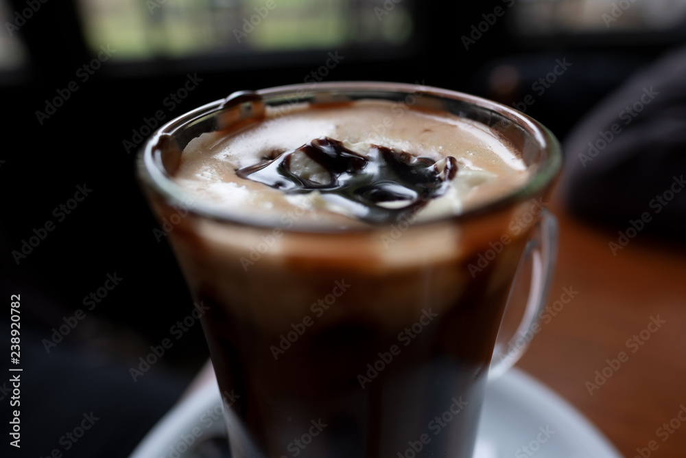 cup of coffee with cream on wooden background cup of coffee with cream on wooden background