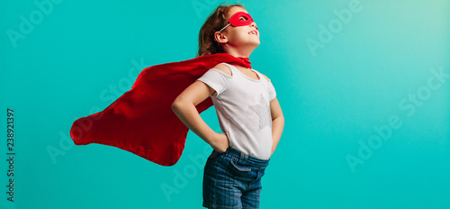 Girl in superhero costume photo