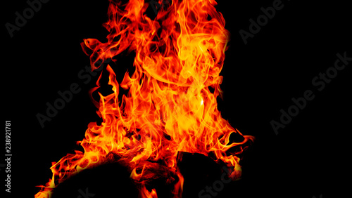 Fire flames on Abstract black background, Burning red hot sparks rise from large fire in, Fiery orange glowing