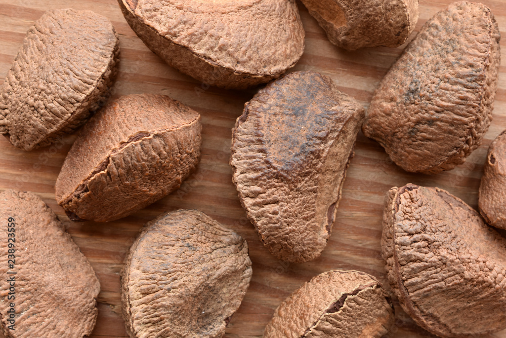 a backgound of brazil nuts in there shells a backgound of brazil nuts in there shells