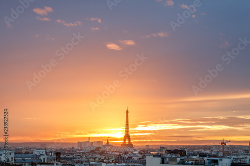 Photography aerial view from the heights on paris and the eiffel tower at sunset