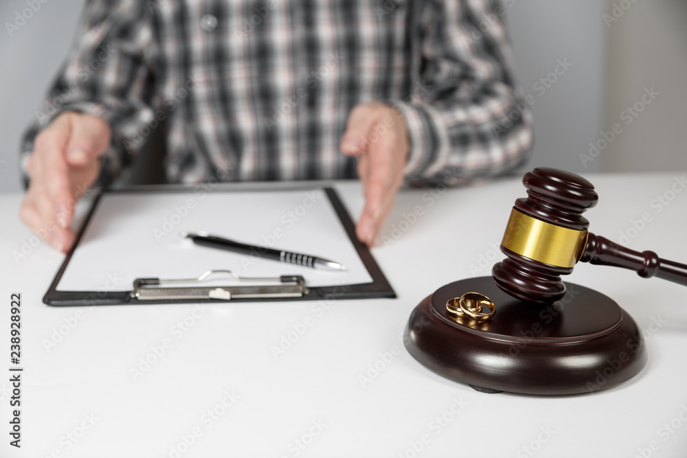 Judge gavel deciding on marriage divorce. Judge gavel deciding on marriage divorce.