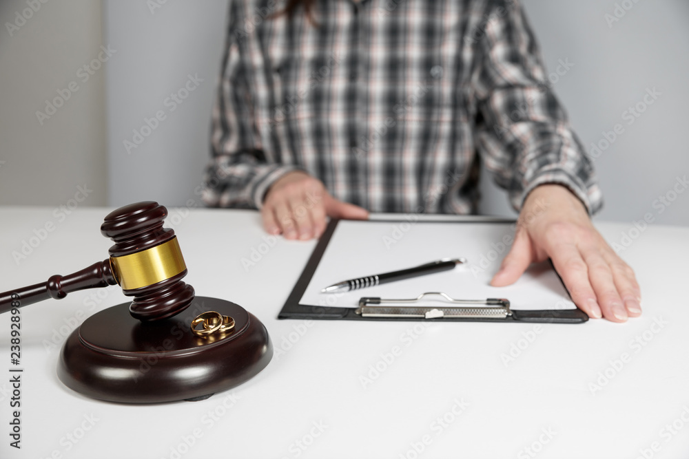 Judge gavel deciding on marriage divorce. Judge gavel deciding on marriage divorce.