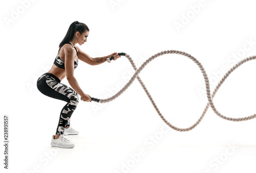 Strong muscular woman worki...