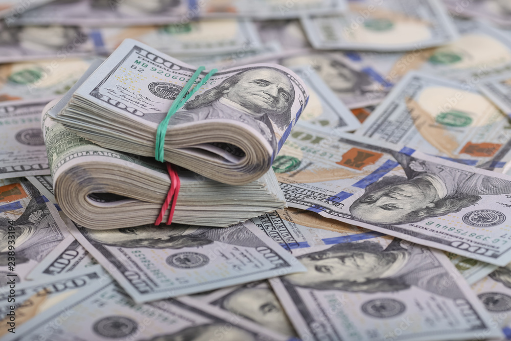 American dollars in one hundred banknotes. Lot of dollars close up American dollars in one hundred banknotes. Lot of dollars close up
