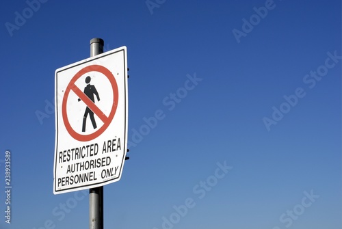 Stock photo of restricted area warning sign.