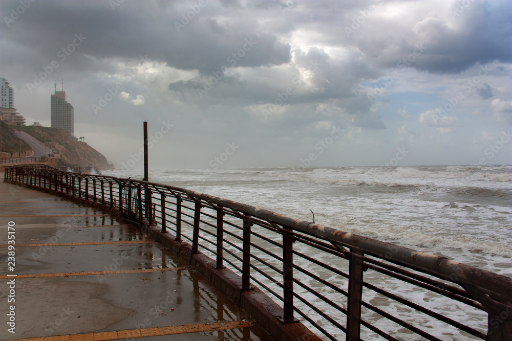 View of the stormy sea from the waterfront