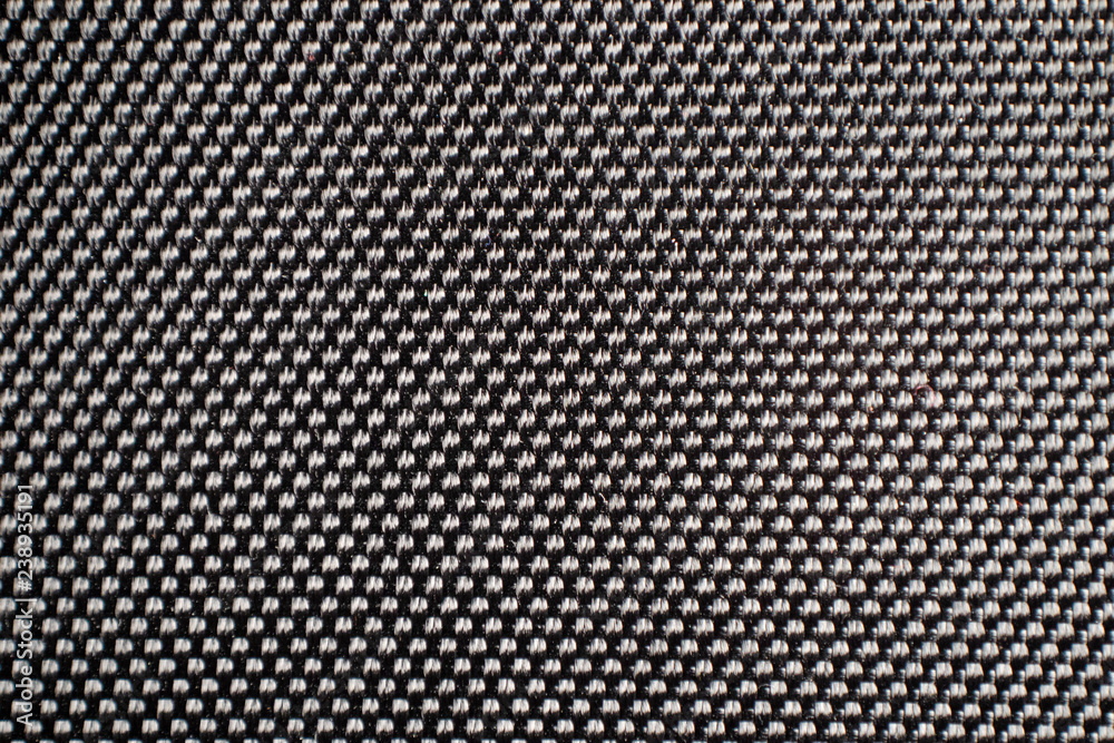 The braided structure of the material is dark gray