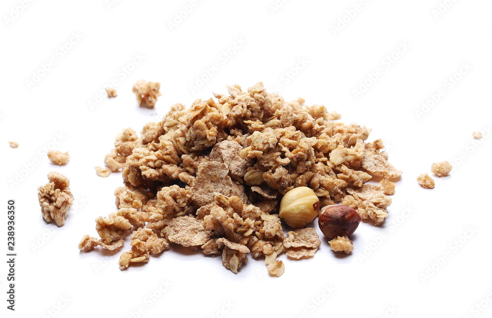 Crunchy granola, muesli pile with nuts isolated on white background Crunchy granola, muesli pile with nuts isolated on white background