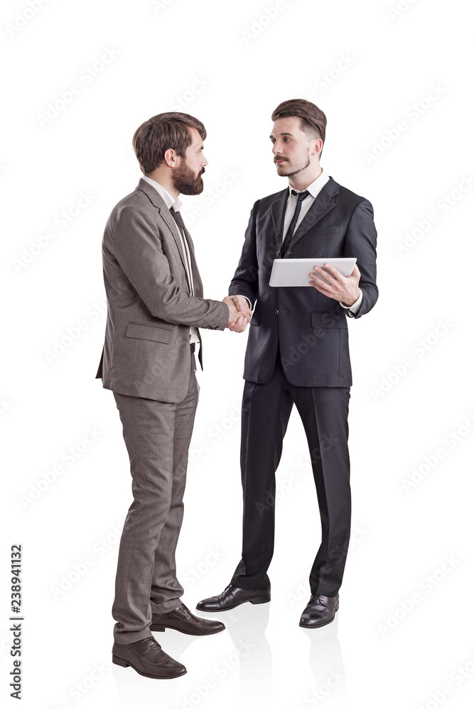 Two young businessmen shaking hands, isolated Two young businessmen shaking hands, isolated