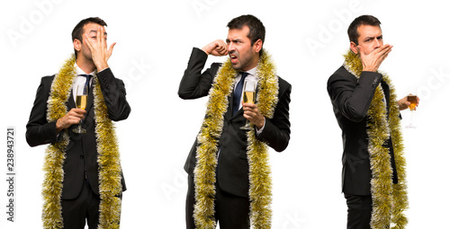 set of Man with champagne celebrating new year 2019 coverin ears mouth and face photo