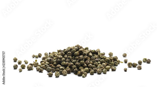 Dry green pepper pile, peppercorn isolated on white