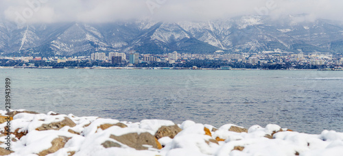 Gelendzhik and snow on the Markotkh mountains photo