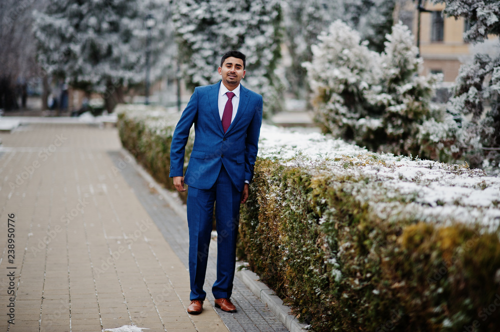 Elegant indian fashionable man model on suit posed at winter day. Elegant indian fashionable man model on suit posed at winter day.