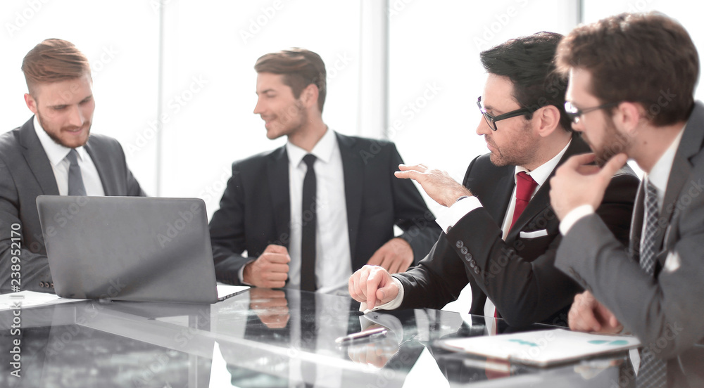 business people discussing the terms of the new contrac business people discussing the terms of the new contrac