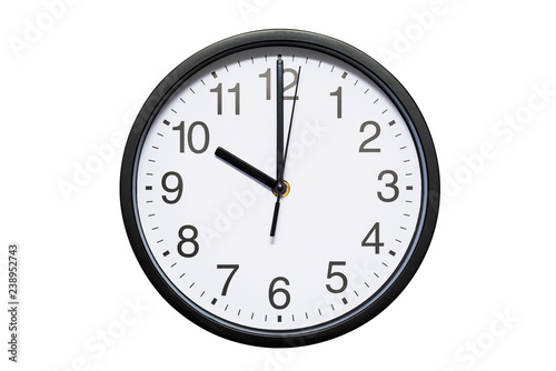 Wall clock shows time 10 o'clock on white isolated background. Round wall clock - front view. Twenty two o'clock