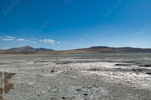 view of beach with blue sky and clouds