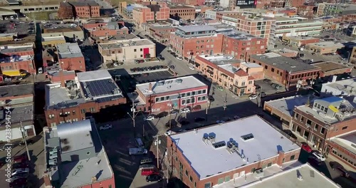 Backwards Drone Flight Tilts Up to Reveal Kansas City Skyline