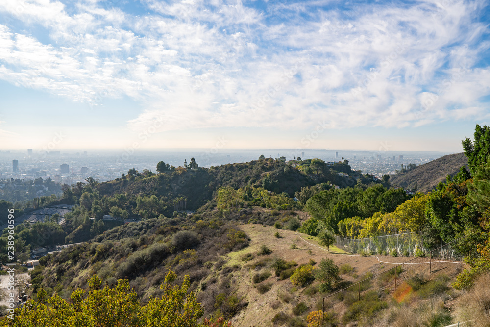 View of Los Angeles from the Hollywood Hills. Down Town LA. Hollywood Bowl. Warm sunny day. Beautiful clouds in blue sky. 101 freeway traffic. View of Los Angeles from the Hollywood Hills. Down Town LA. Hollywood Bowl. Warm sunny day. Beautiful clouds in blue sky. 101 freeway traffic.