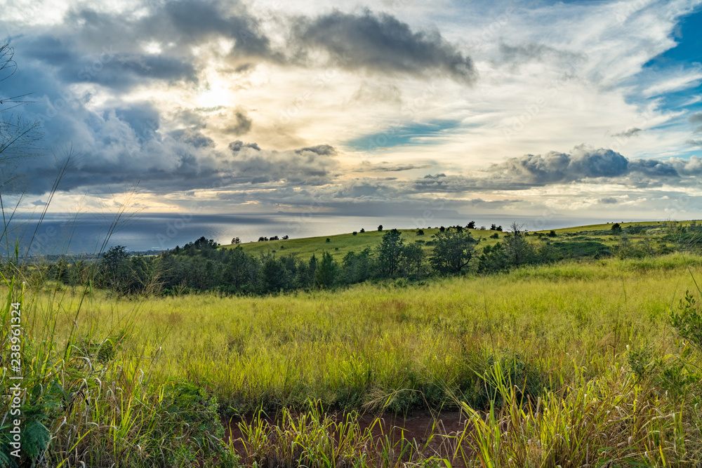 Dramatic clouds over the ocean, looking west from the first pull out on highway 550, Waimea, Kauai, Hawaii