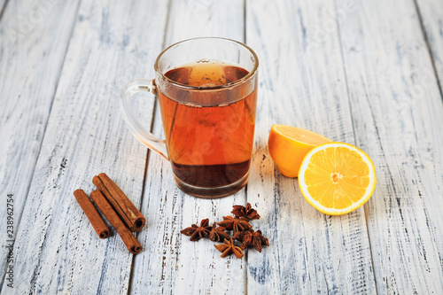 hot tea, cinnamon sticks, star anise and orange