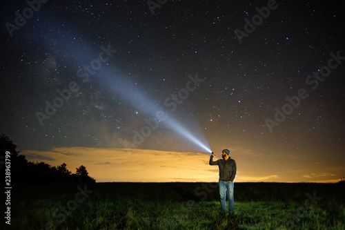 Searching with flashlight in outdoor