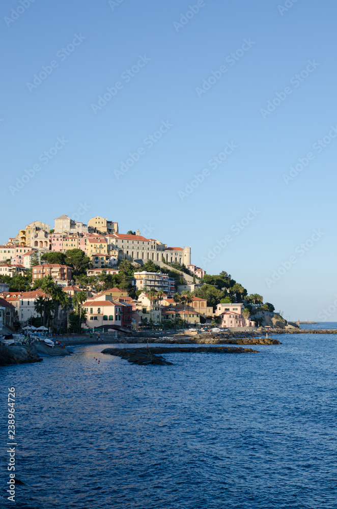 Small fishing village in Liguria. Horizontal view with sea and blue sky.