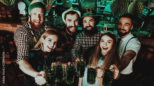 Canvas Print Young Company With Beer Glasses. St Patrick's Day.