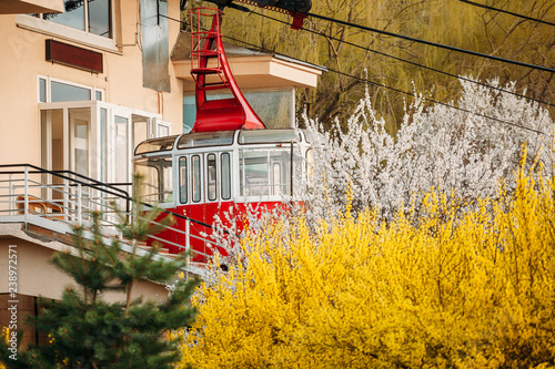 red funicular cable car  in the spring near the top station photo