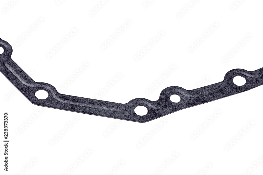 Seal gasket for gearbox pallet, replaceable car part close-up isolated on white background. Seal gasket for gearbox pallet, replaceable car part close-up isolated on white background.