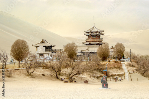 Mingsha shan sand mountain and Crescent moon lake in Dunhuang, Gansu, China photo