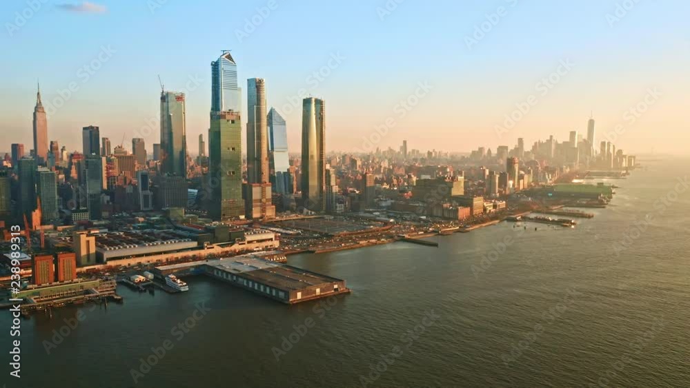 Aerial drone footage of New York skyline with camera rotation in front of midtown Manhattan skyscrapers
