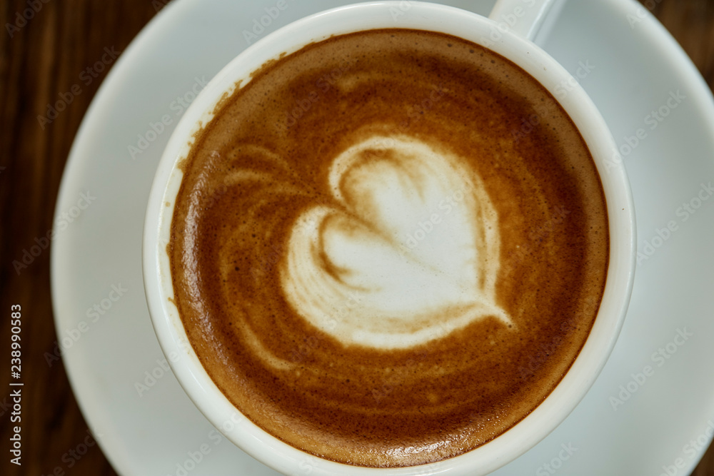 Cup of coffee with heart pattern Cup of coffee with heart pattern