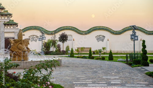evening landscape with moon over traditional chinese park