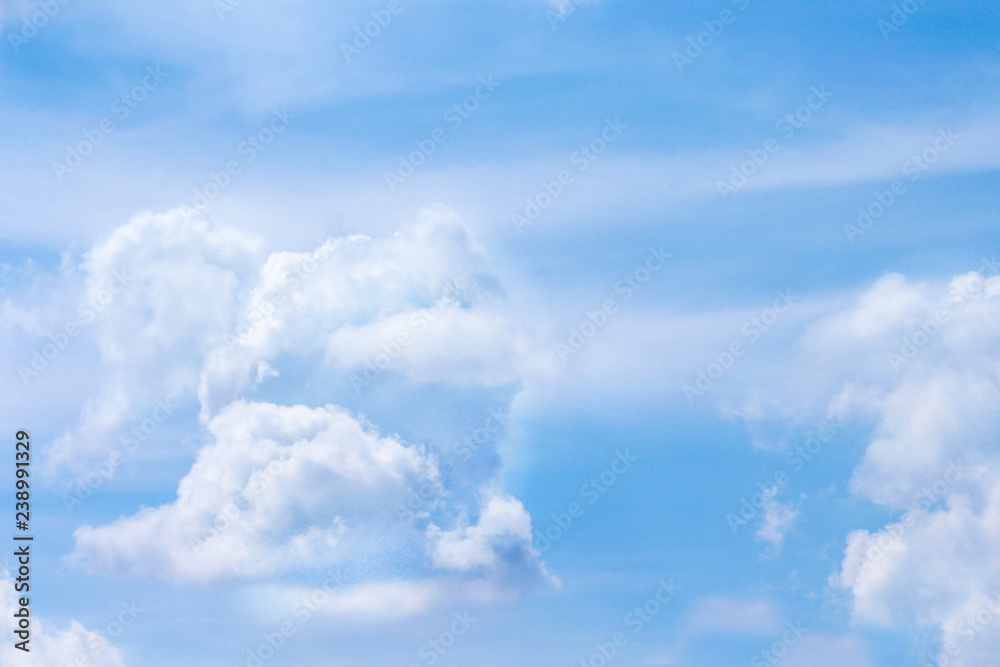 Cloud groups patterns on bright bluesky background with