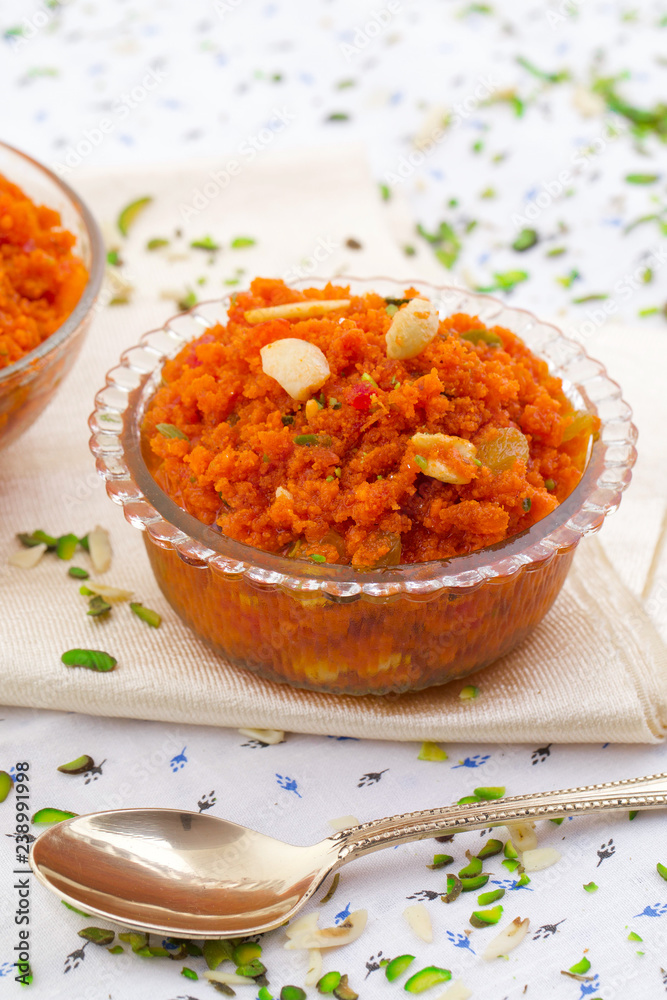 Indian Popular Sweet Food Carrot Halwa Also Know as Gajar ka Halwa, Carrot Dessert, Carrot Halva or Gajrela is a Carrot-Based Sweet Dessert Pudding From India Indian Popular Sweet Food Carrot Halwa Also Know as Gajar ka Halwa, Carrot Dessert, Carrot Halva or Gajrela is a Carrot-Based Sweet Dessert Pudding From India